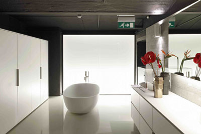Stylish and elegant, open plan bedroom/bathroom arrangements look great in modern homes.
