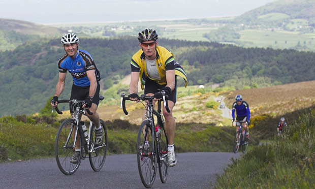 Cyclists on Tour of Wessex, climbing through Exmoor